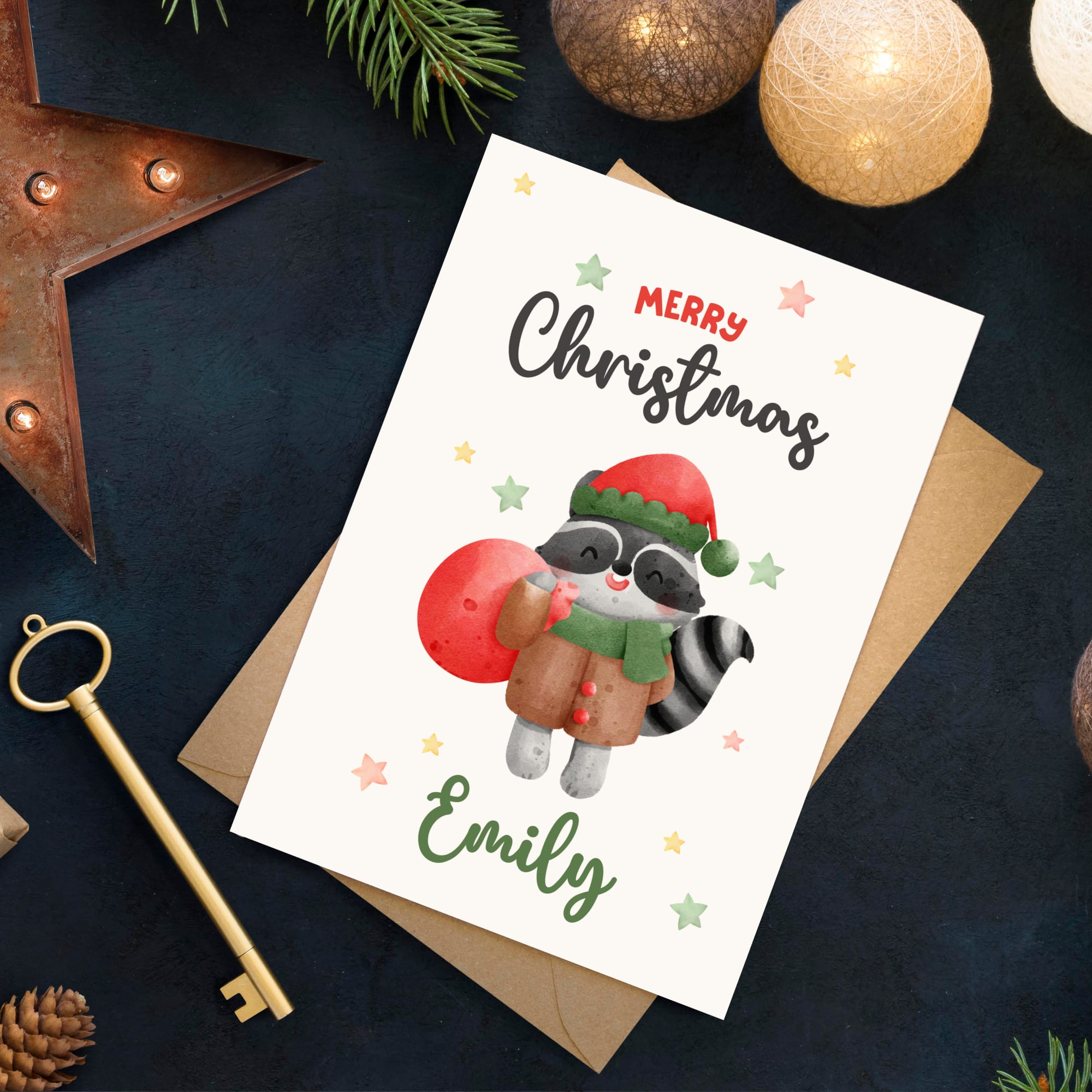 Christmas card with a raccoon illustration and 'Merry Christmas Emily' text, surrounded by festive decorations.