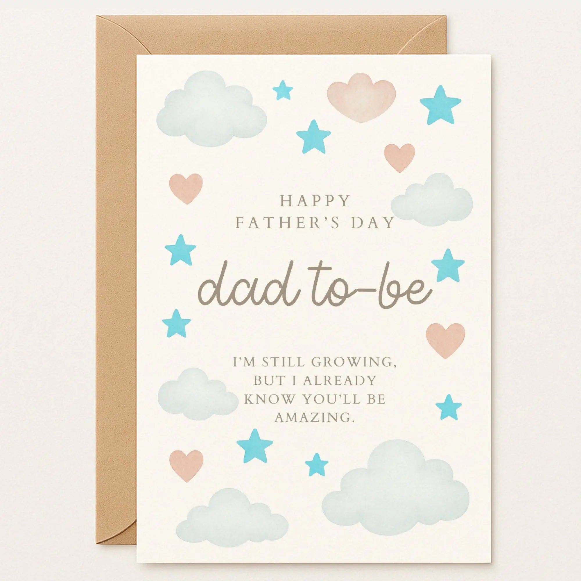 Father’s Day card for dad-to-be with pastel blue clouds and stars. Message: “I’m still growing, but I already know you’ll be amazing.” Adorable handmade card for a dad-to-be. Blue clouds, stars, and the sweetest message from the bump. A Printarelle original.