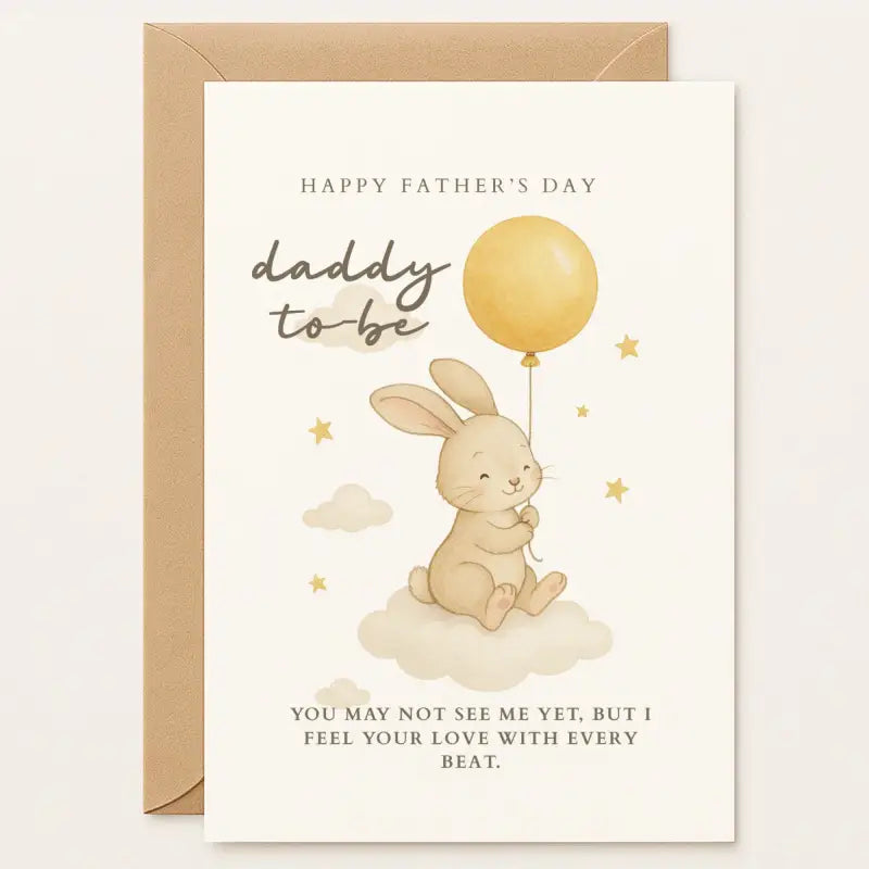 Father’s Day card for daddy-to-be with a smiling bunny holding a yellow balloon on a cloud. Message reads: “I feel your love with every beat.” You may not see them yet, but this sweet bunny card from the bump says it all. Celebrate first-time dads with Printarelle's handmade magic.