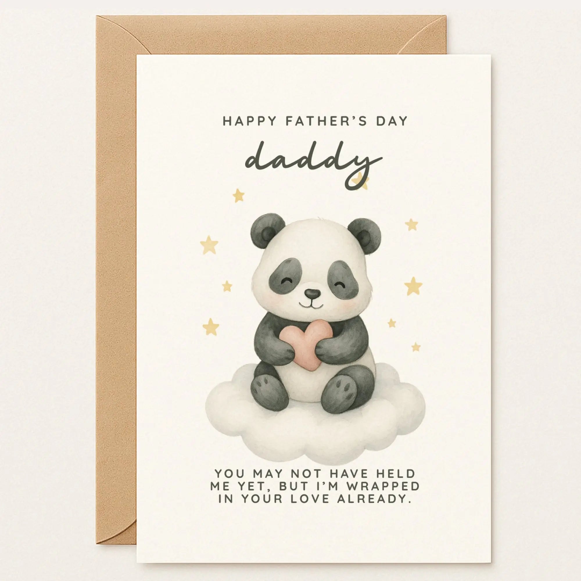 Father’s Day card featuring a baby panda holding a heart on a cloud. Message: “You may not have held me yet, but I’m wrapped in your love already.”