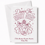 A white debs card with pink glitter foil heels and disco ball design saying dance the night away in elegant script
