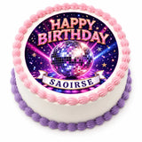 A round birthday cake with white frosting and a vibrant disco ball icing sheet cake topper saying happy birthday saoirse