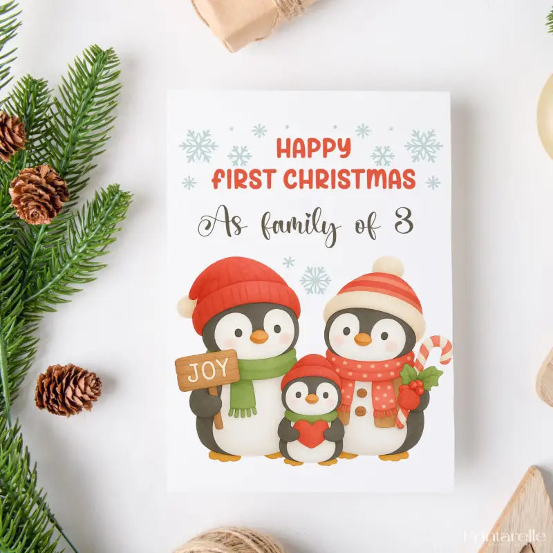 Christmas card with penguin family illustration and festive text on a white background.