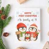 Christmas card with penguin family illustration and festive text on a white background.