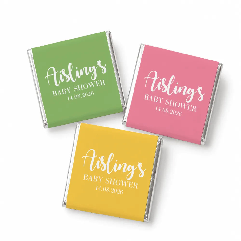 Three mini neapolitan chocolates in green pink and yellow foil with aisling’s baby shower 14.08.2026 text for baby shower favors