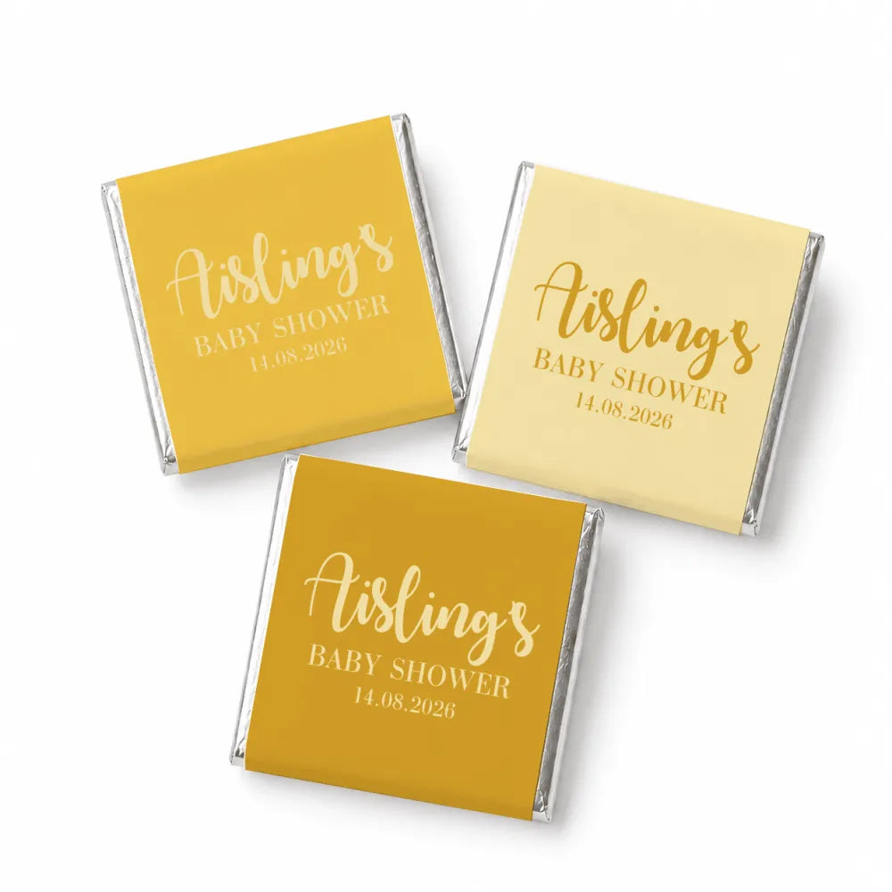 Gold foil wrapped mini neapolitan chocolates with aisling’s baby shower in elegant script for baby shower favors