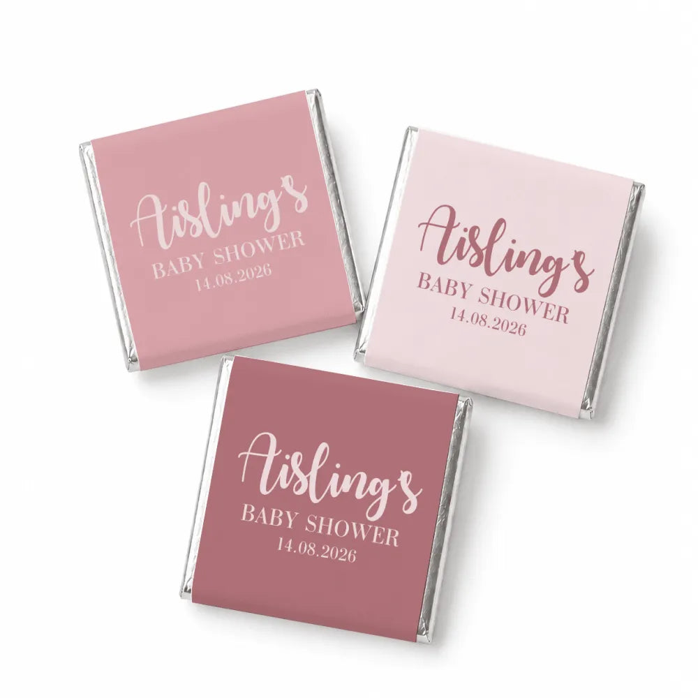 Pink and mauve wrapped mini neapolitan chocolates with elegant script aislings baby shower favors design