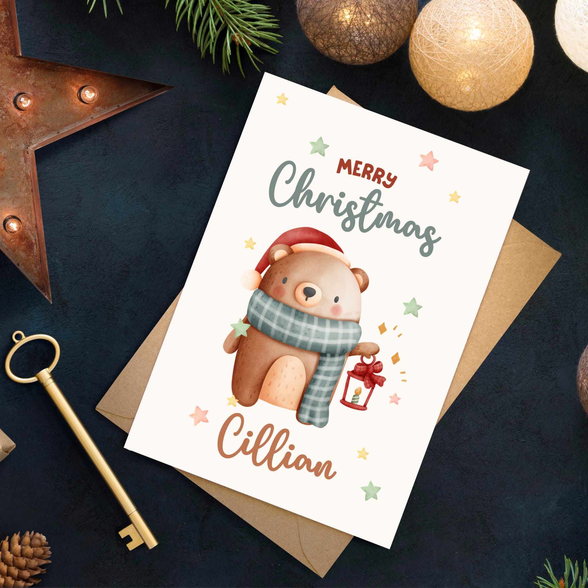 Christmas card with a bear illustration and 'Merry Christmas Cillian' text, surrounded by festive decorations.