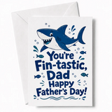 White fathers day card with cartoon blue shark and fin-tastic dad message on premium cardstock with kraft envelope