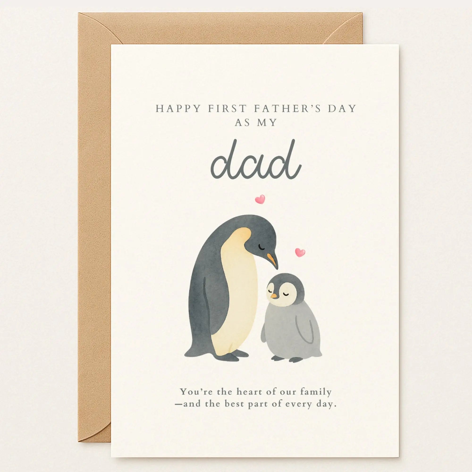Father’s Day card with an adult penguin and chick leaning close, surrounded by hearts. Text reads: “Happy First Father’s Day as my Dad.”