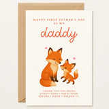 This illustrated First Father’s Day Card features an adorable fox duo, a proud parent and playful cub, nuzzling under