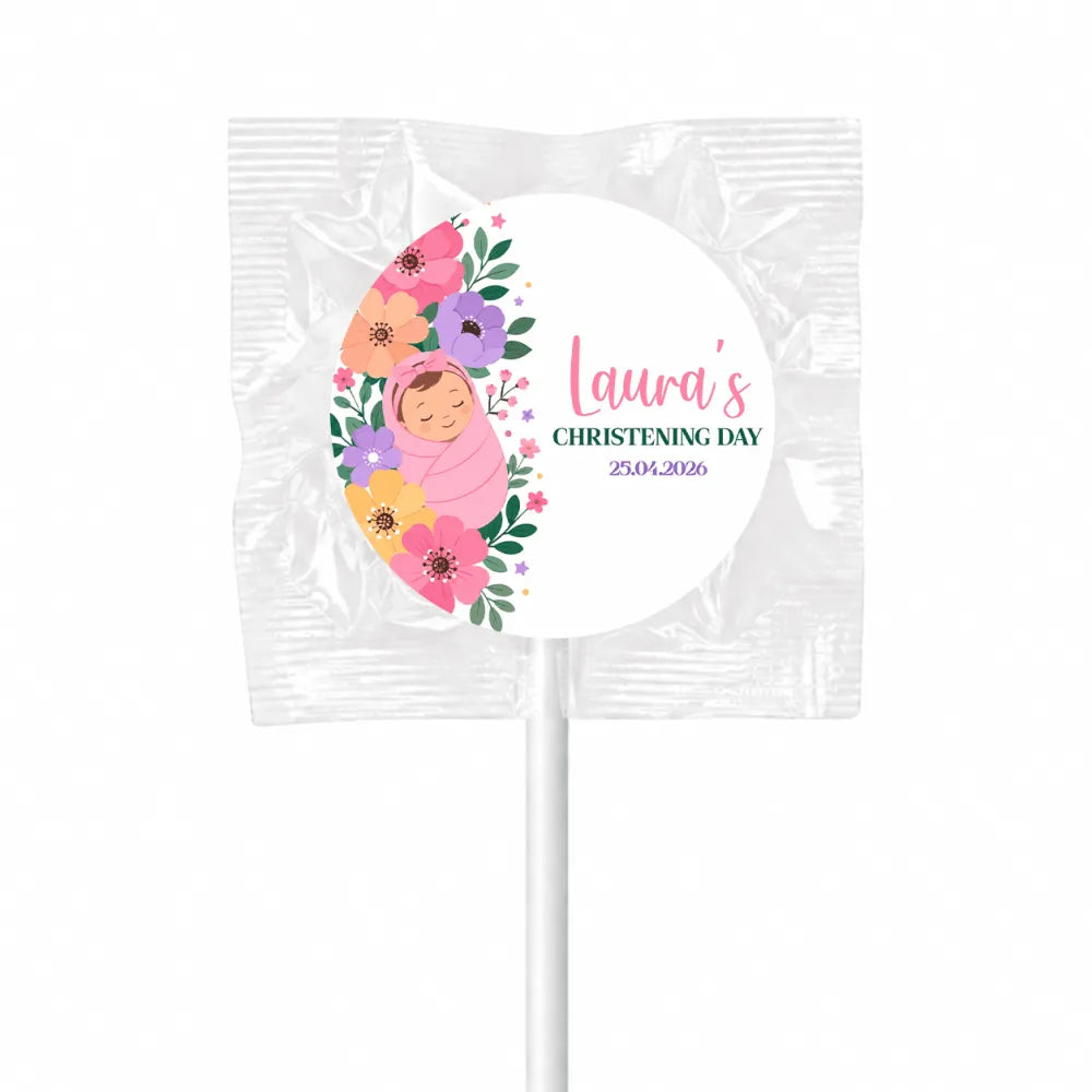 A personalized pink floral swaddle design lollipop wrapper with a sleeping baby for lauras christening day 25 04 2026