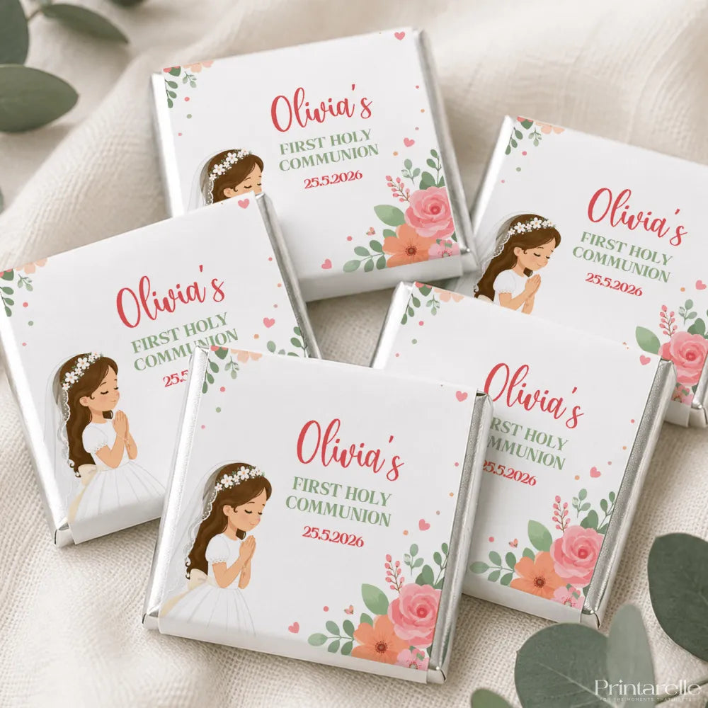 Personalized white chocolate mini neapolitan chocolates with pink floral designs and a cartoon girl in a communion dress