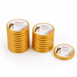 Golden 40mm milk chocolate coins with white labels featuring a cartoon girl floral designs for olivias first holy communion