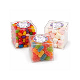 Clear acrylic cube containers filled with colorful jelly beans gummy worms and marshmallows for floral wreath wedding clear box with wedding date foil sticker