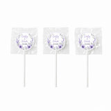 Three lavender floral wreath themed lollipop wedding favours wrapped in clear cellophane with white sticks