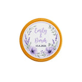 A 40mm milk chocolate coin with gold edge and lavender floral design as personalised wedding favours emily and derek 15.8.2026