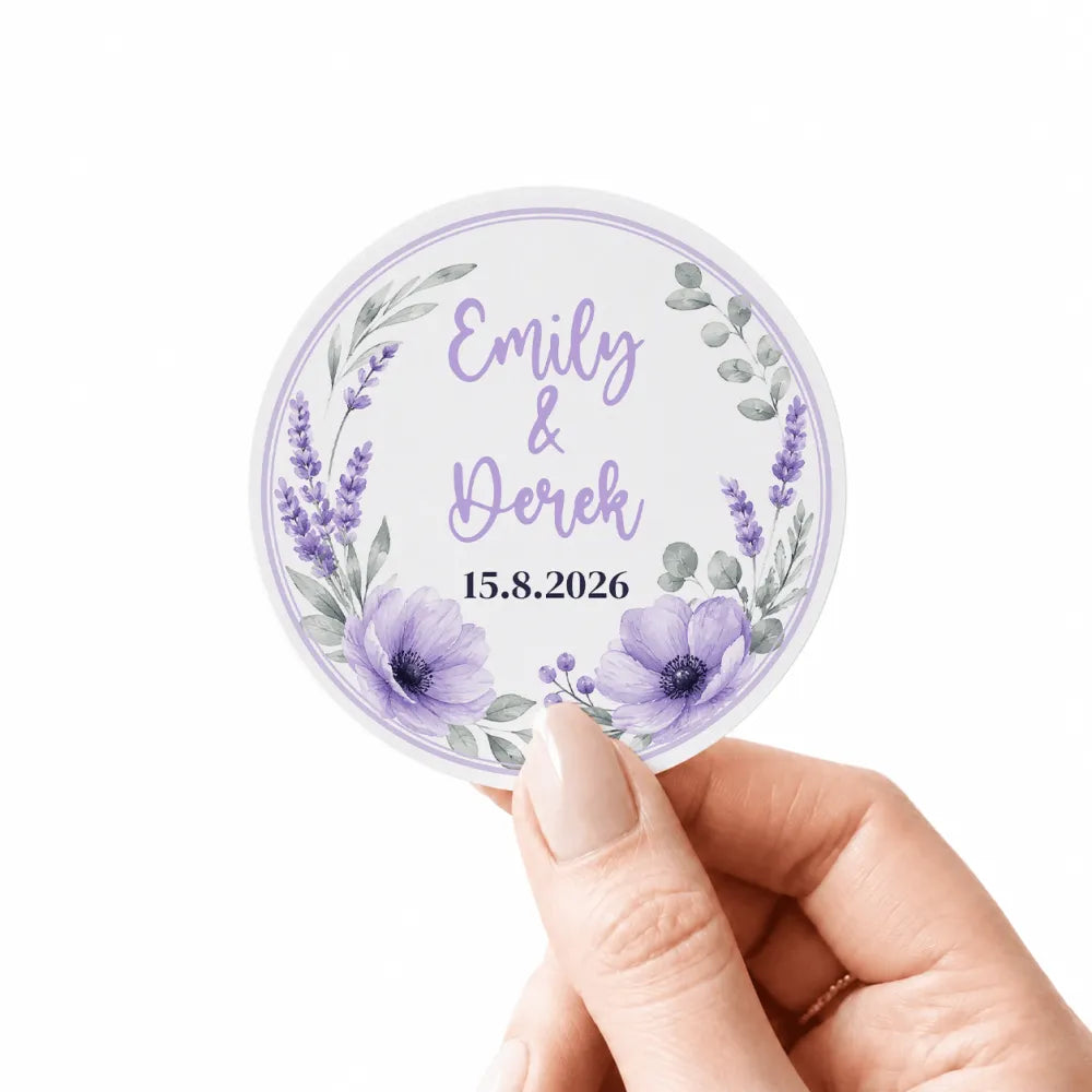 A circular floral wreath wedding sticker in lavender and gray with real foil colors personalized with emily and derek 15.8.2026