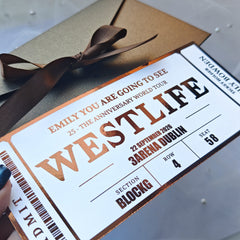 Ticket-style gift box with 'Westley' branding and a brown ribbon.