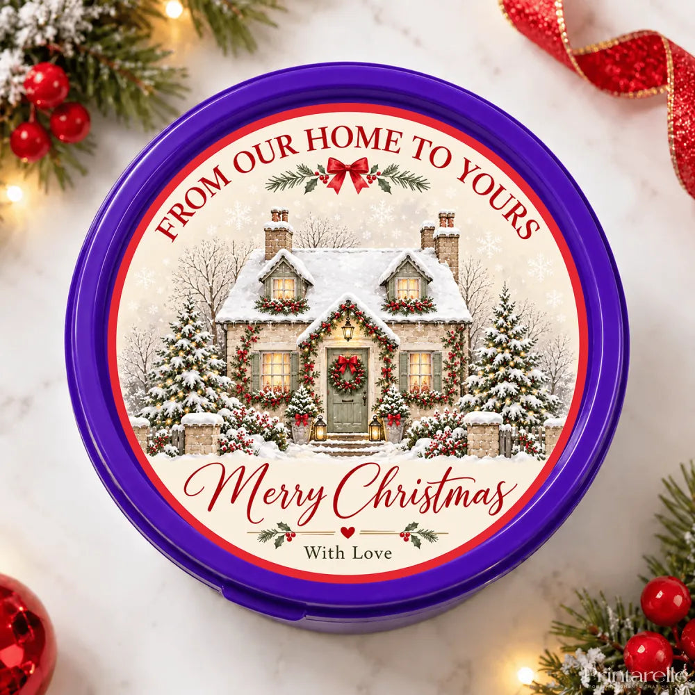 Purple circular chocolate tub with snow-dusted cottage and festive christmas gifts design from our home to yours tub sticker