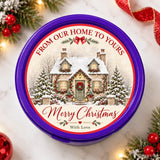 Purple circular chocolate tub with snow-dusted cottage and festive christmas gifts design from our home to yours tub sticker