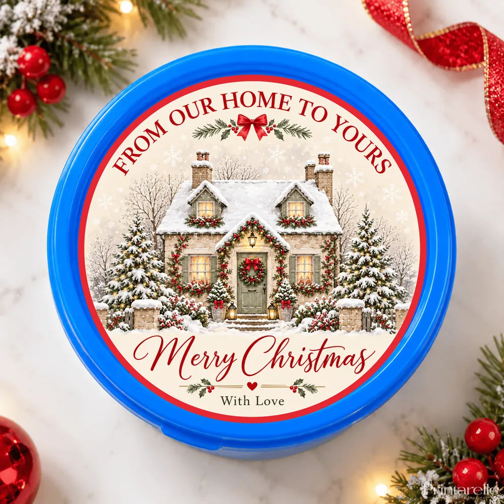 Blue plastic christmas chocolate tub featuring a snow-dusted cottage and festive holiday greetings perfect for christmas gifts