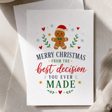 White christmas card featuring a smiling gingerbread man in red and green attire for your best decision gift