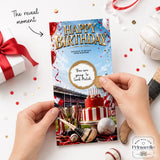 A gaa birthday scratch card with a red and white striped cake, trophies, sports gear, and a gold scratch sticker under blue sky