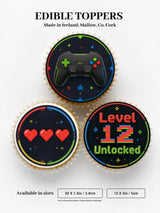 Black edible pixelated video game controller cupcake topper with colorful buttons for gaming birthday level unlocked fun