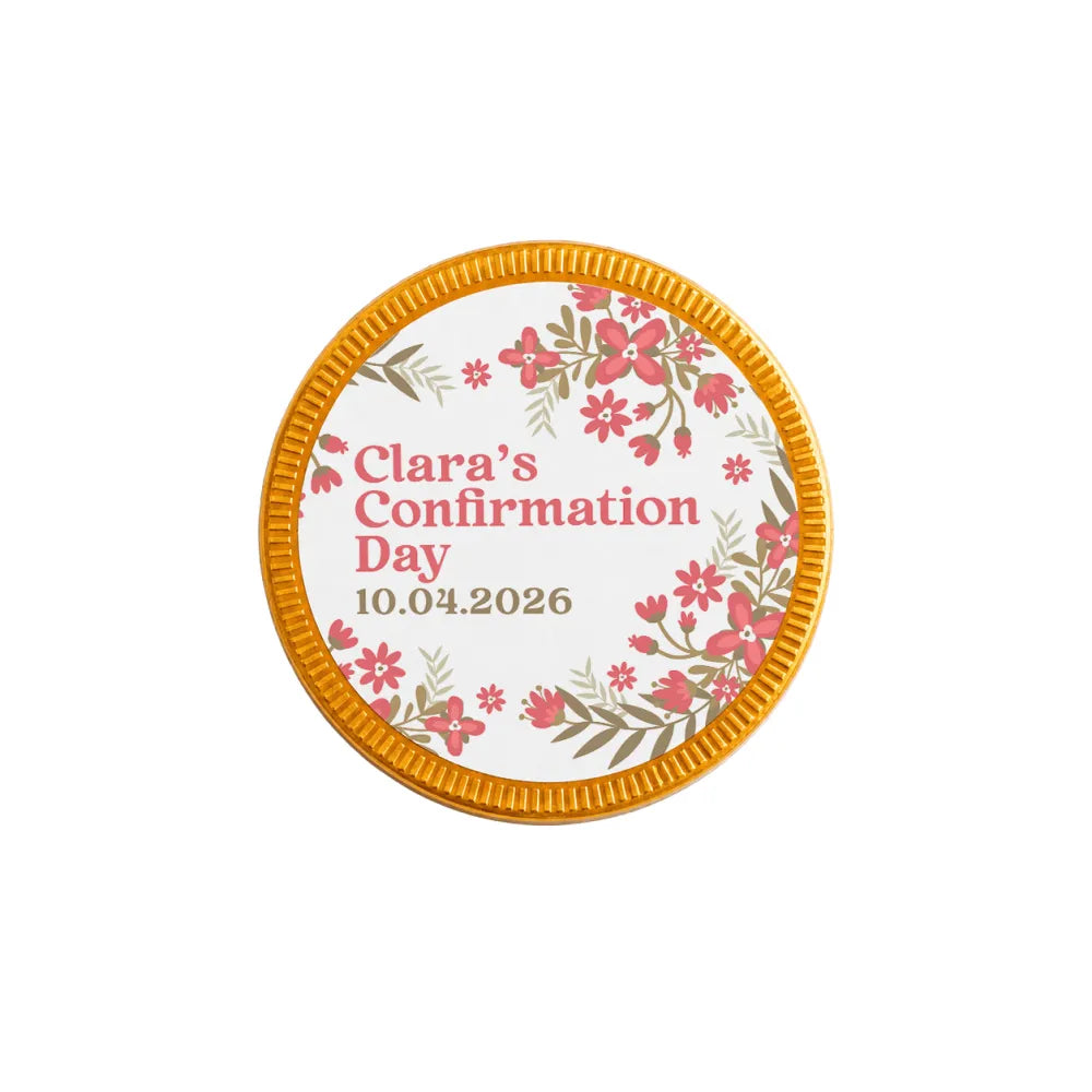 A 40mm milk chocolate confirmation chocolate coin with gold edge and pink floral design for clara’s confirmation day