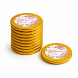 Golden 40mm milk chocolate confirmation chocolate coins with floral design and personalized text for claras confirmation day