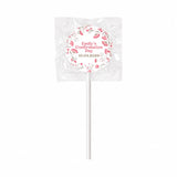 A pink floral patterned lollipop favour with emily’s confirmation day 10 04 2026 featuring fuller wreath and olive leaves designs