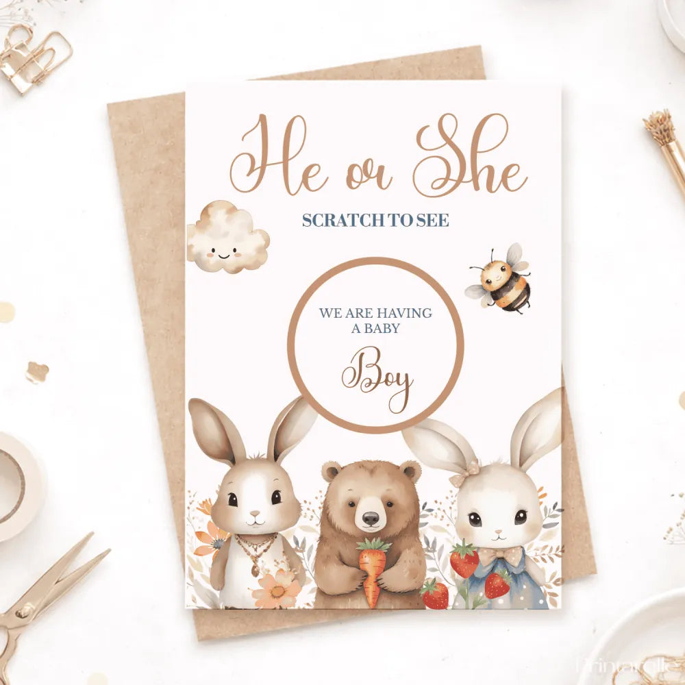 Baby shower card with cartoon animals and text 'He or She Scratch to See We Are Having a Baby Boy' on a white background.