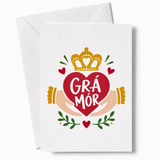 A white greeting card with a vibrant red heart crowned in gold and the irish phrase grá mór perfect for an irish love card