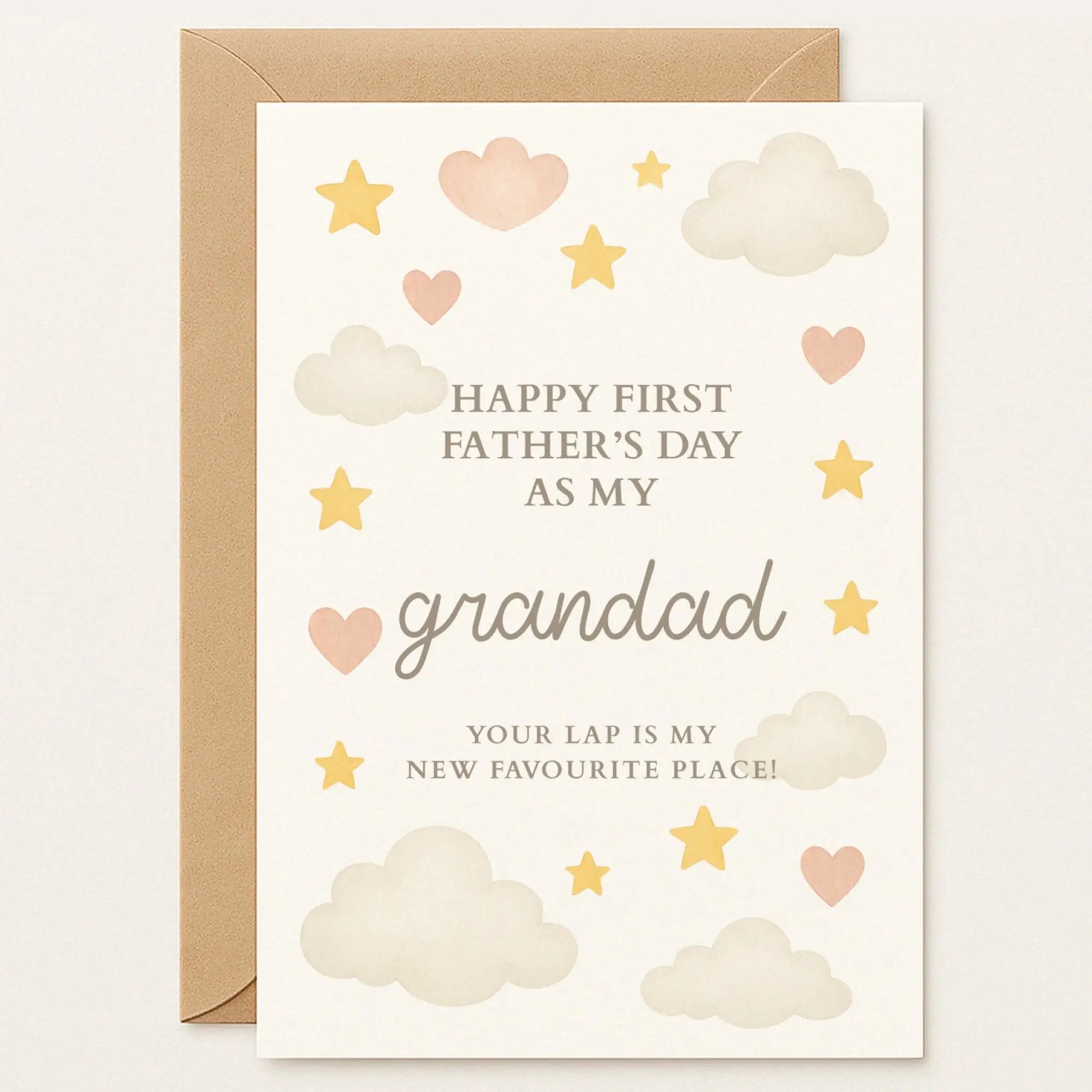 First Father’s Day card for grandad with pastel clouds and stars. Text: “Your lap is my new favourite place!” Sweet handmade card for grandad’s first Father’s Day. Features pastel stars, hearts, and a heartfelt quote about cuddles and love.