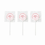 White lollipop favours with 8cm red and white circular labels featuring emilys confirmation day text and dove design wrapped in clear plastic