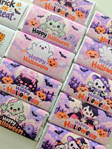 Pink and purple halloween favour bundle chocolate coins and bars wrapped with ghost pumpkin and vampire designs