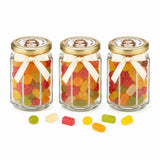 Three personalised hex jars with 48mm pale gold lids, cream ribbons, printed stickers, filled with colorful gummies