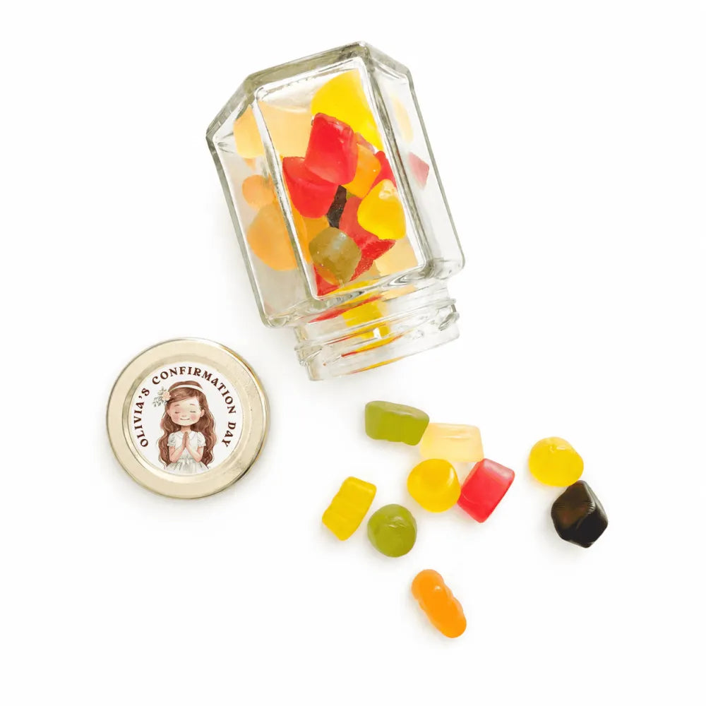 Clear glass hex jar with silver lid and personalised sticker featuring a girl filled with colorful gummies for confirmation day