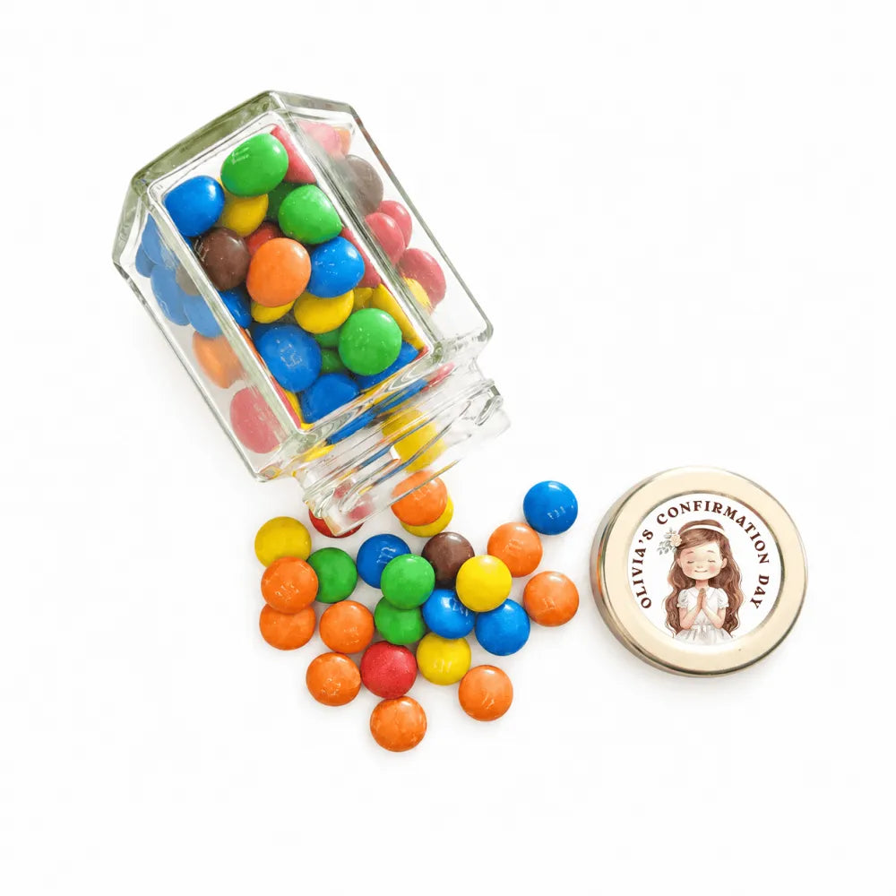 Clear glass halo grace confirmation hex jar with pale gold twist lid and personalised sticker spilling colorful mms