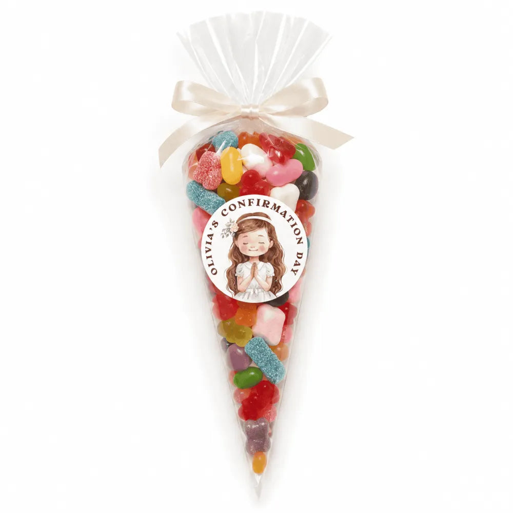 A clear cellophane sweet cone filled with colorful heart gummies tied with cream ribbon and a praying girl label