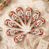 Clear plastic sweet cones filled with colorful gummy candies tied with cream ribbons and a praying girl sticker