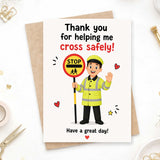 Greeting card with a cartoon character holding a stop sign and text 'Thank you for helping me cross safely! Have a great day!' on a white background.