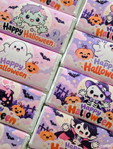 Happy halloween personalised 40g chocolate bar favour with pink and purple halloween-themed chocolate bars and cartoon characters