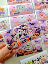 Happy halloween personalised 40g chocolate bar with purple and white halloween wrapper featuring ghosts and pumpkins