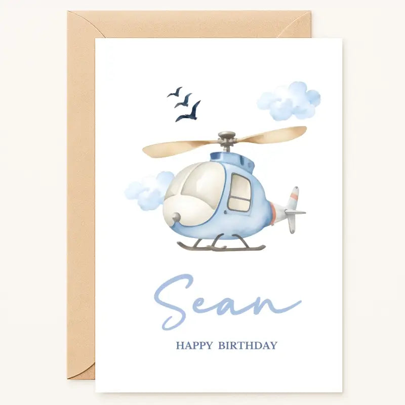 personalised helicopter birthday card with blue chopper and clouds for boys