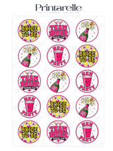 Pink circular hen party cupcake toppers with festive team bride text, champagne bottles, and smiling cups