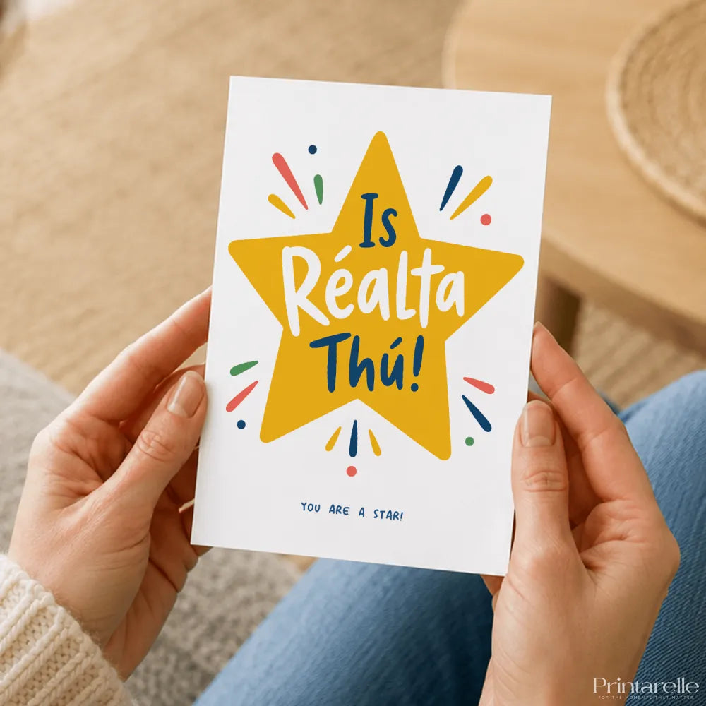 A white greeting card with a bold yellow star and playful réalta thú text, blank inside for your message