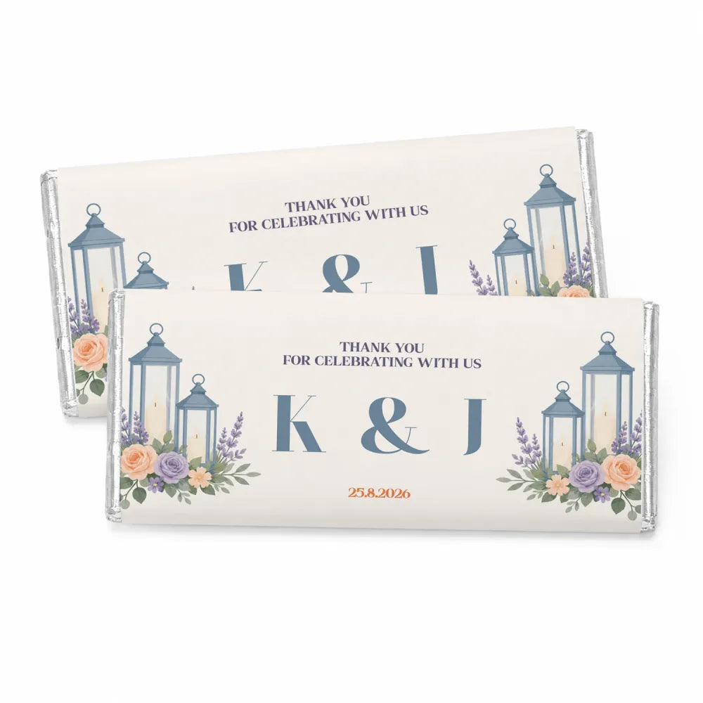 Cream-colored personalised 40g chocolate bar with blue lanterns and floral designs featuring two initials in foil wrap
