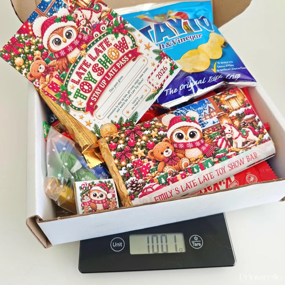 Christmas-themed chocolate bar with an owl and teddy bear design in colorful paper from late late toy sweet box